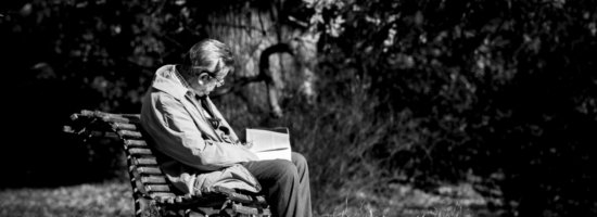 Man reading in park